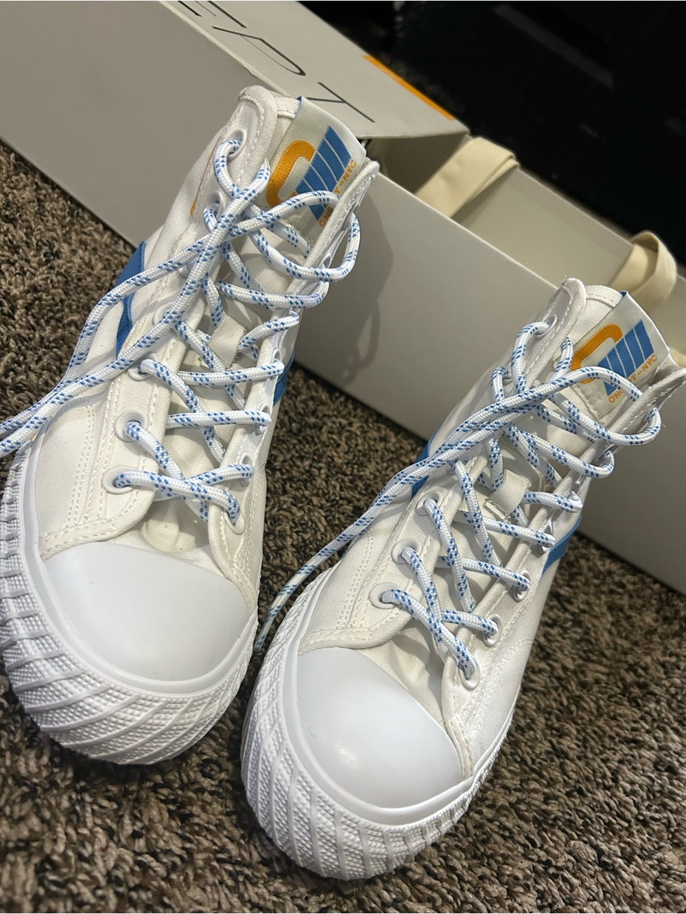 White High-Top Canvas Sneakers with Blue Accents